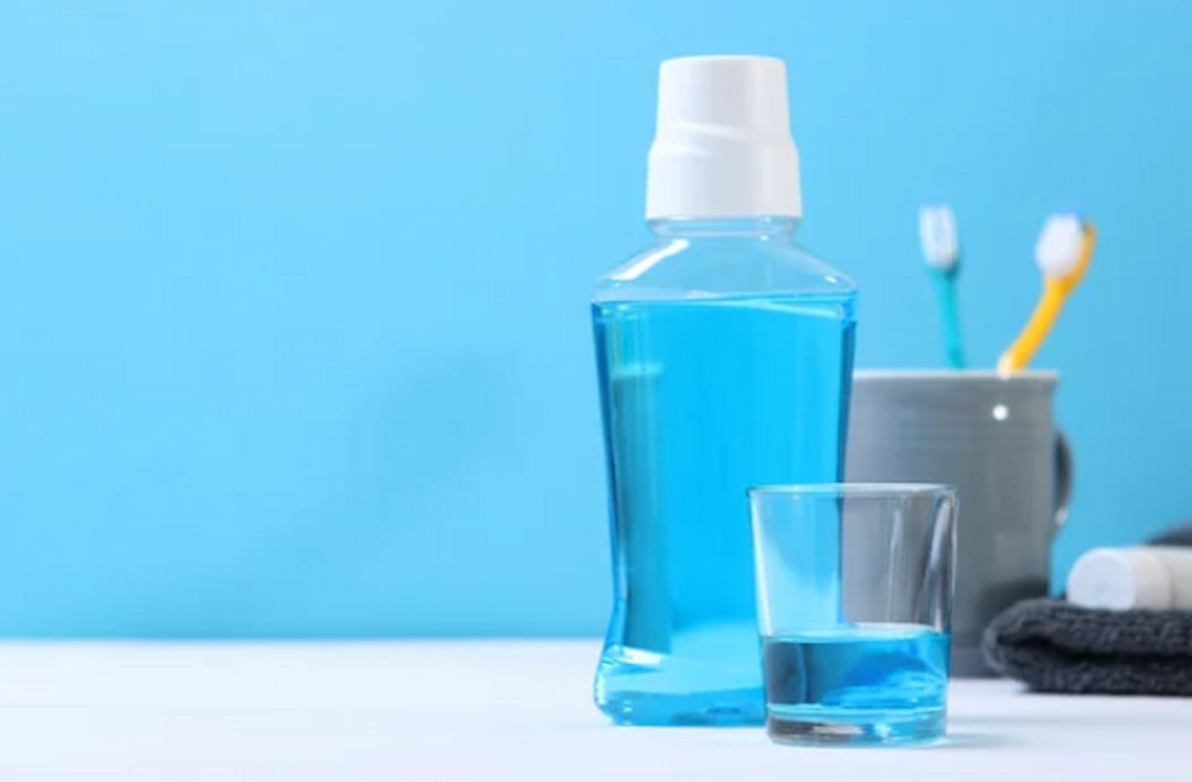 mouthwash in a bottle and in a glass